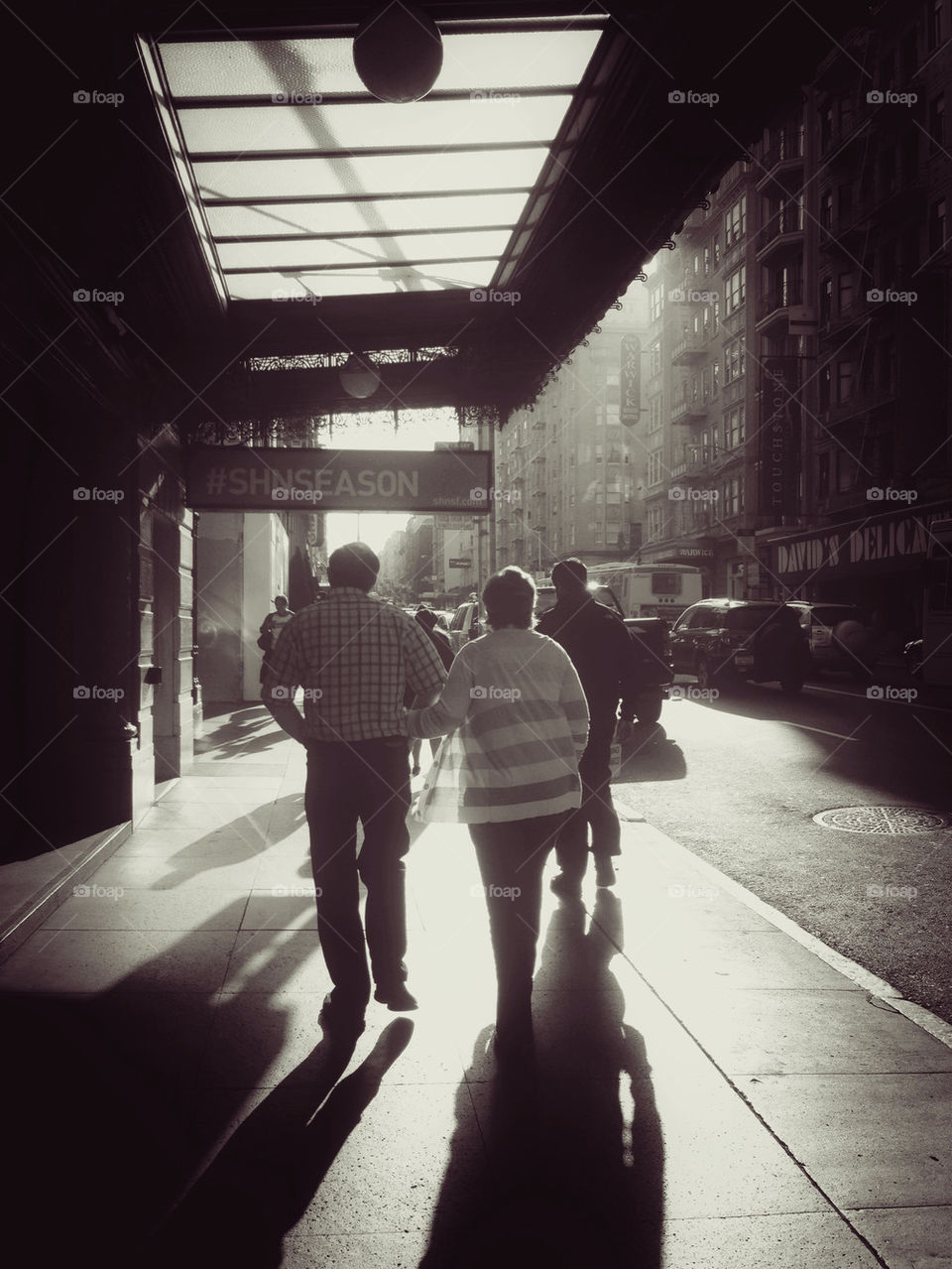 COUPLE TAKING A STROLL IN THE CITY