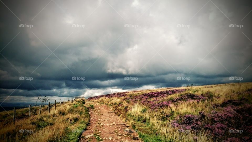 Dark rain clouds over the ladscape