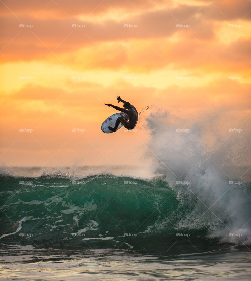 one of the best surfers in the world makes a giant jump