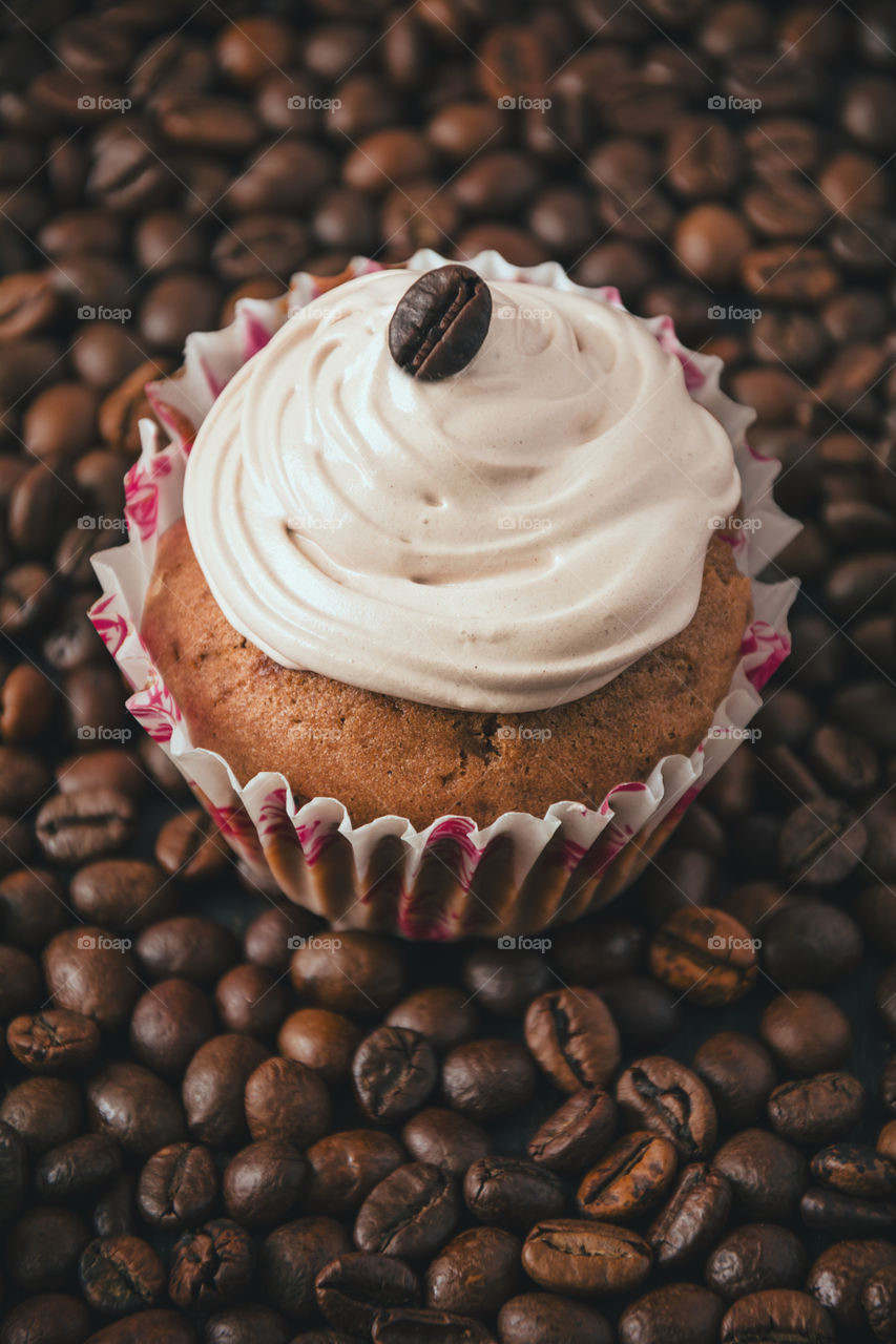 Cupcake with coffee beans