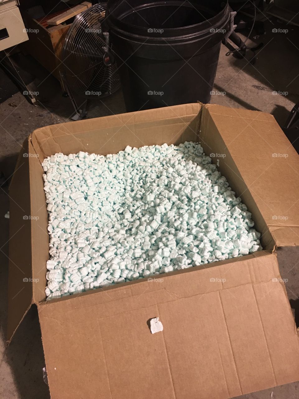 Packing peanuts in a box. 