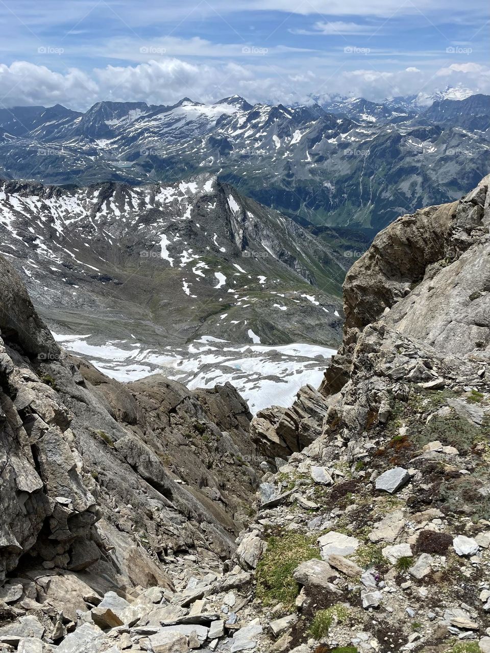 Panoramic view of mountain peaks from Kitzsteinhorn on a sunny day in the Alps of Austria 