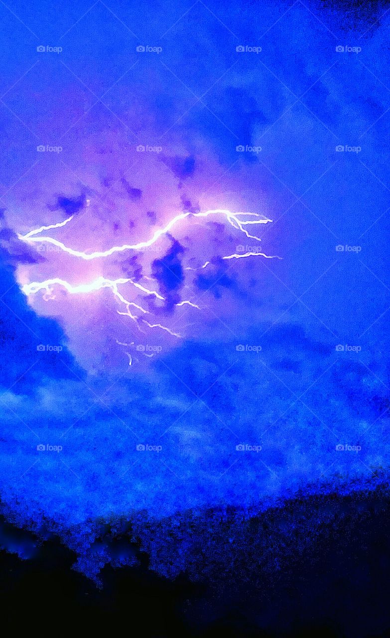 lightning bolts at night
