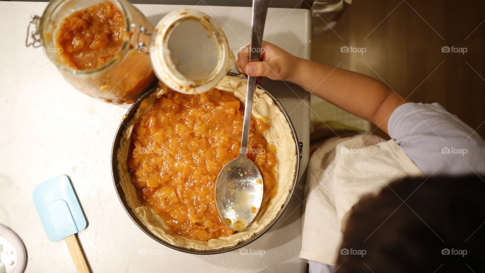 boy cooking winter pie