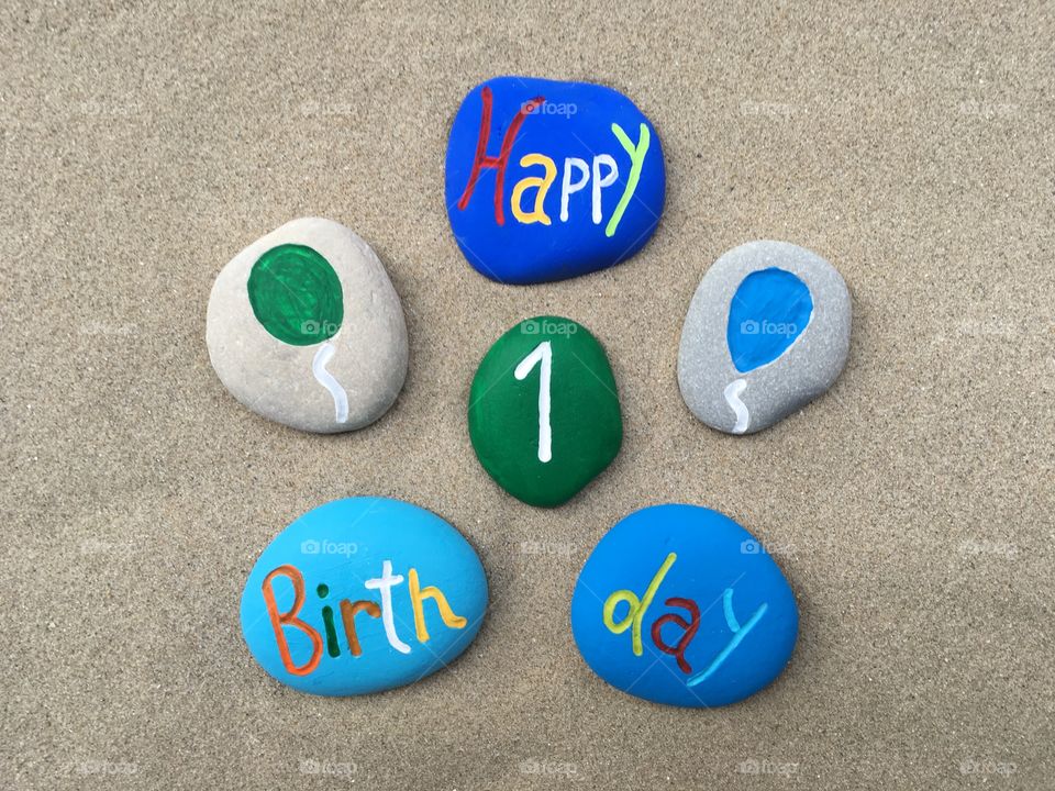 Happy 1  Birthday on stones
