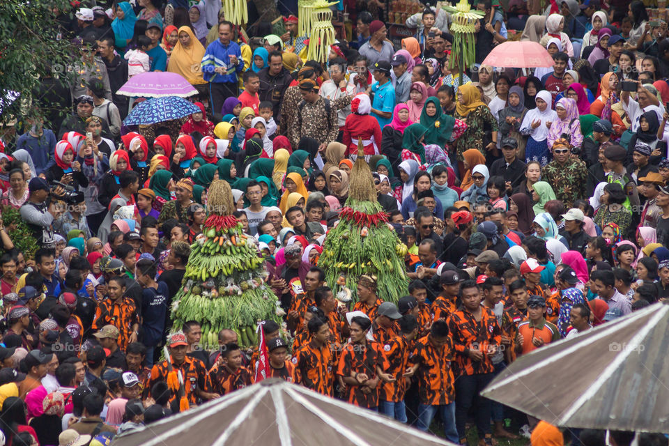 crowd of people in a cultural events