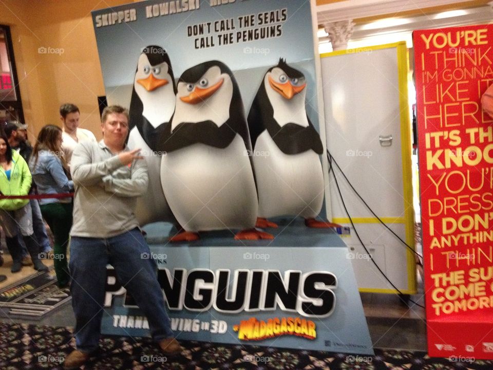 My husband and penguins . Family movie night