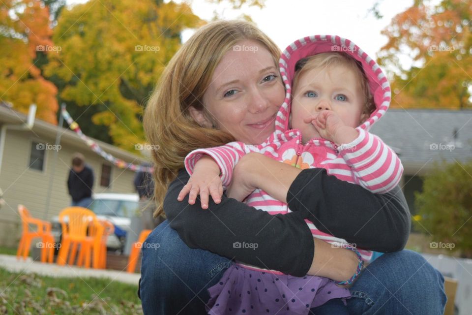 Sweet mother daughter hugging 