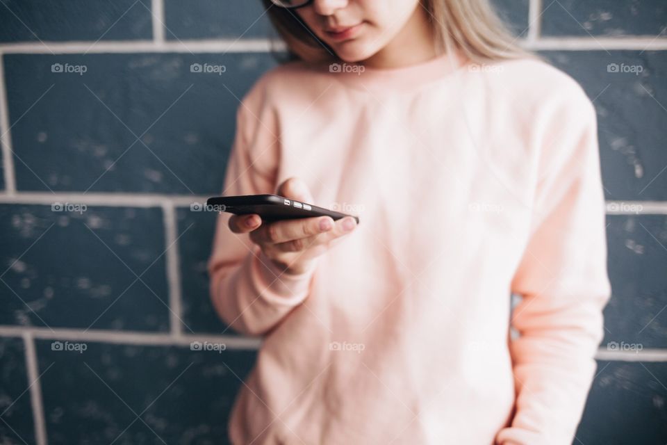 Young woman using cellphone