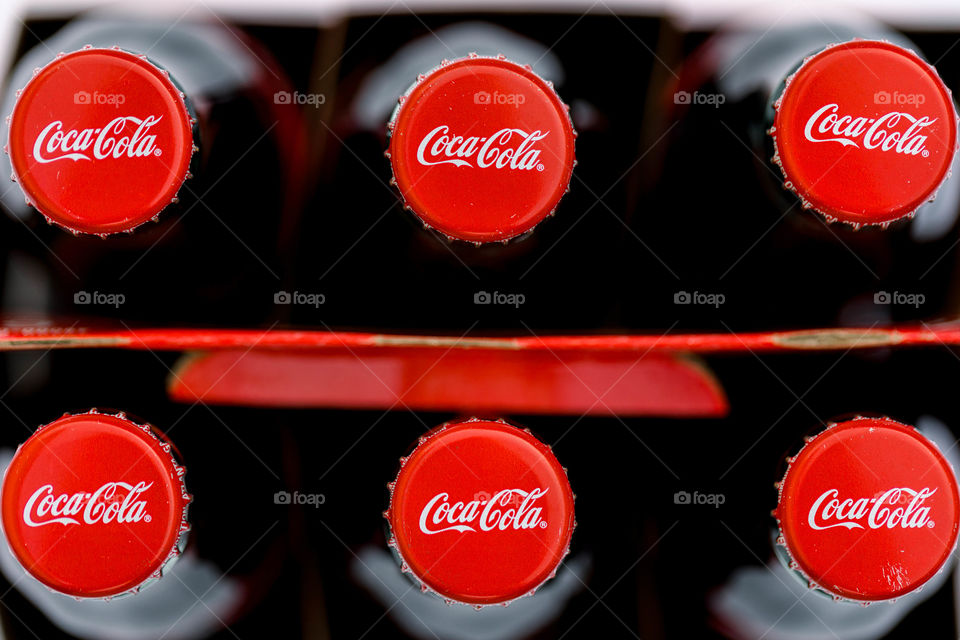 Overhead view of Coca-Cola bottles 