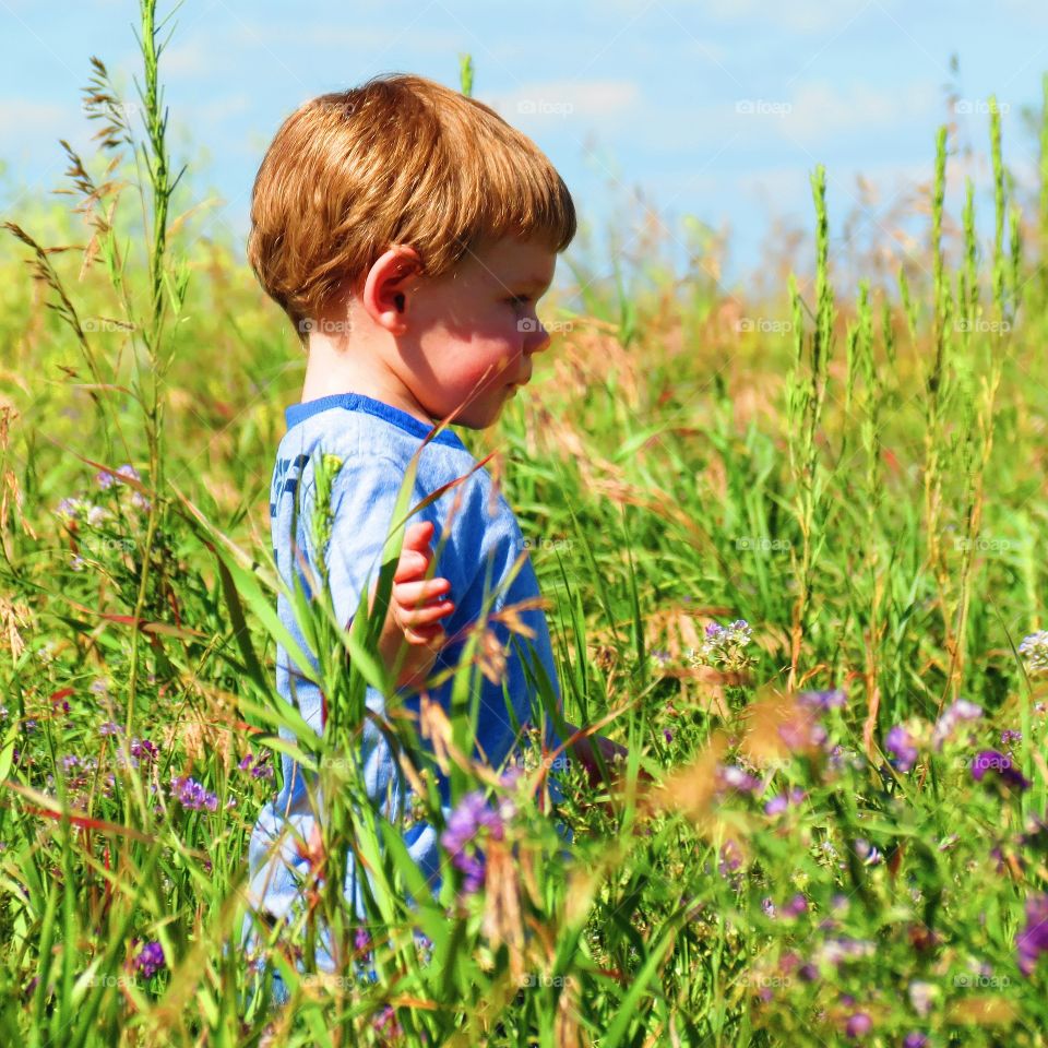 The whole world is in his tiny hands 