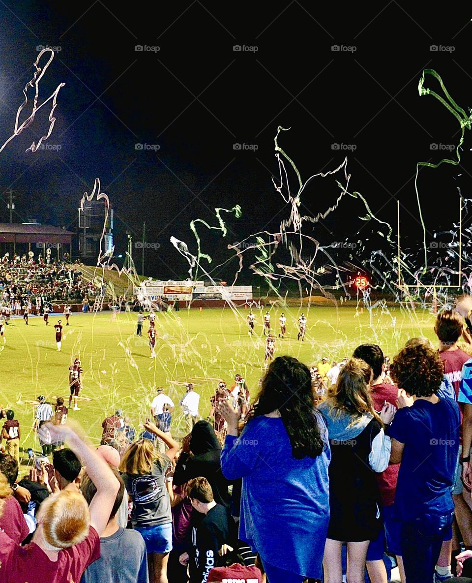 Foal’s Crowds - Football is the world's most popular ball game in numbers of participants and spectators. Big crowds cheer their favorite team, football players playing tackle football out in the football field , and cheerleaders cheering