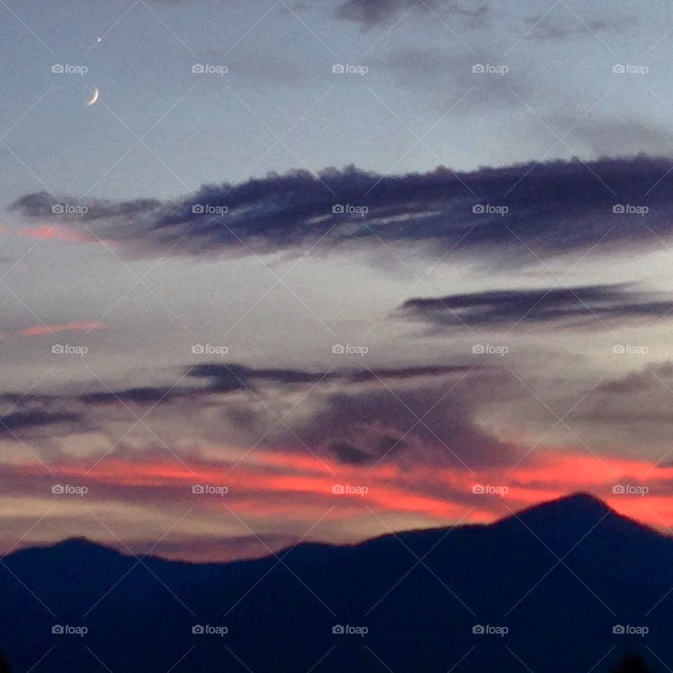 Crescent Moon, Venus and Sunse. A chance encounter on a cool evening stroll in the mountains. 
