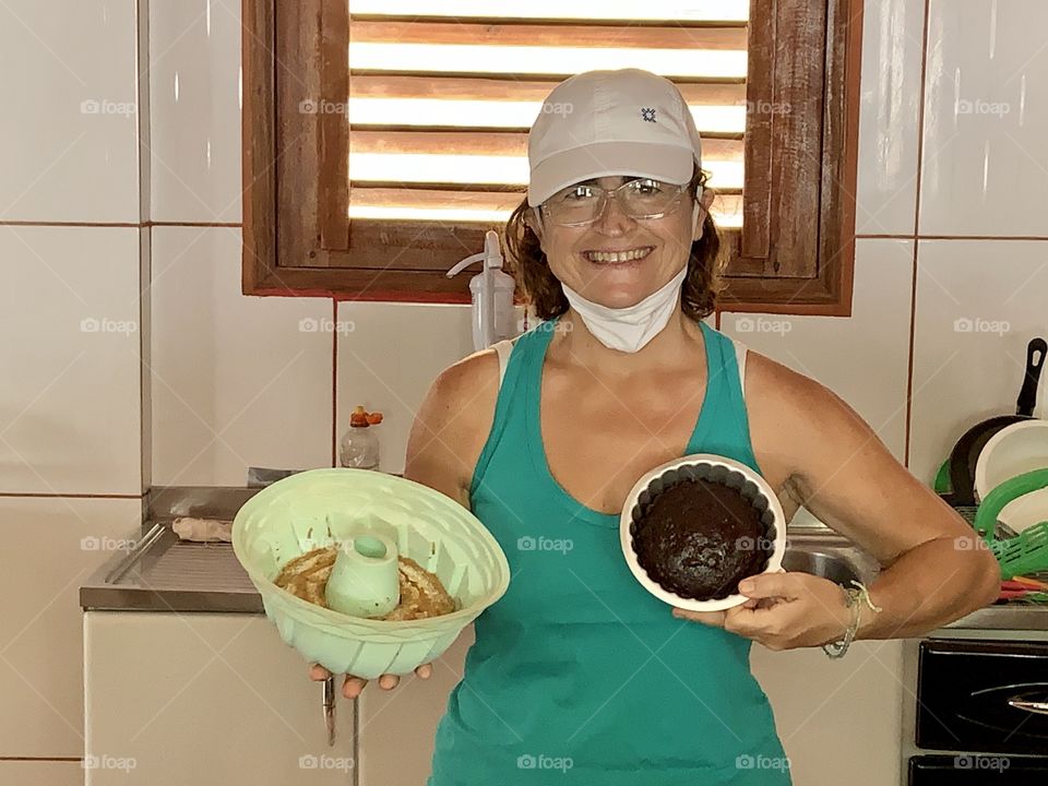 cook of the pousada preparing cakes for breakfast