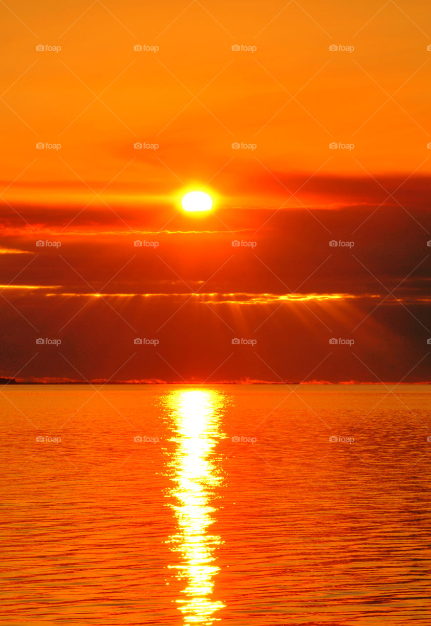 Scenic view of sea at sunset