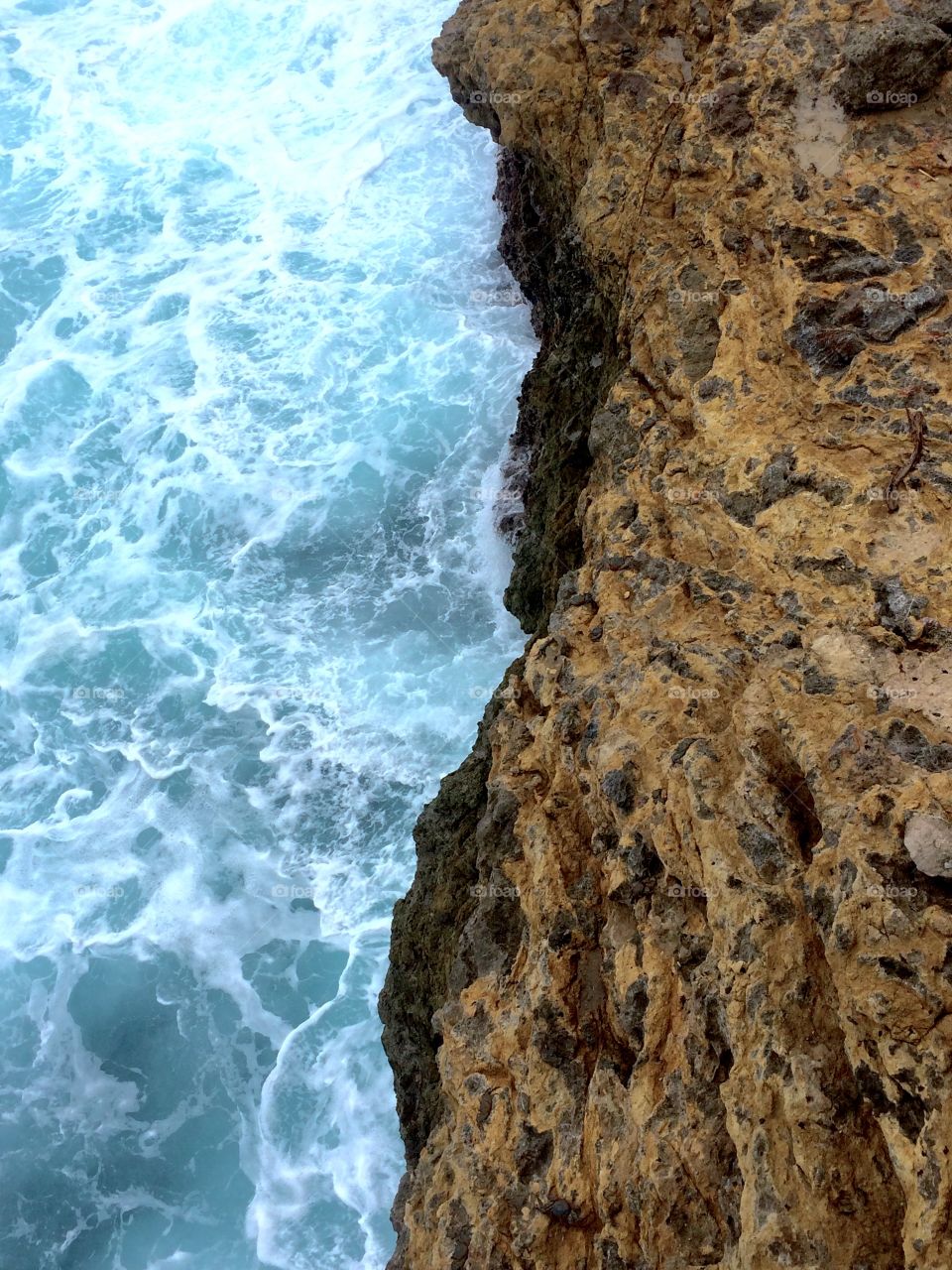Ocean water and edge of a cliff 