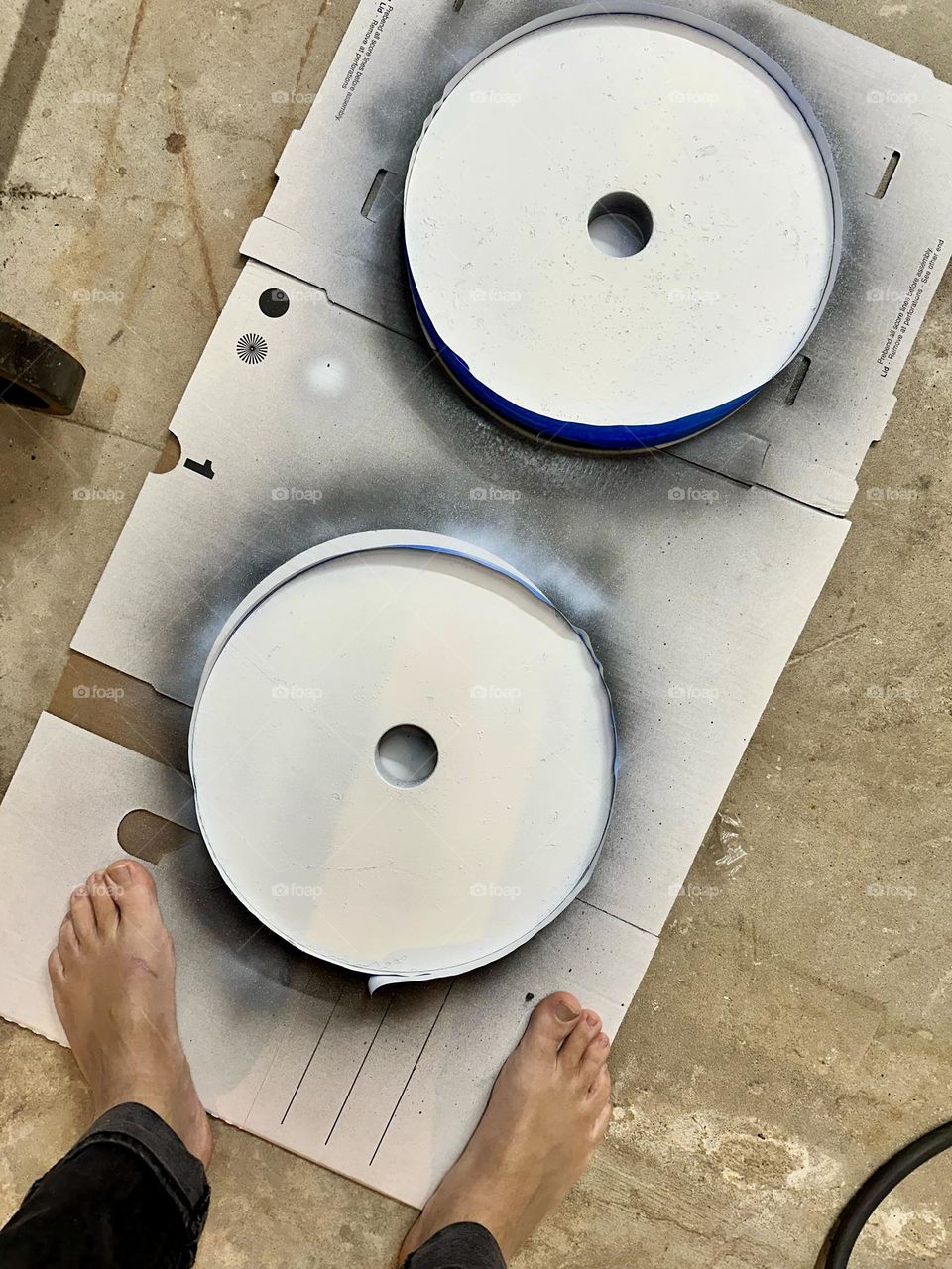 Spray painting weights, making donut weights, being creative with workout equipment, making exercises fun, silly things to do with weight plates