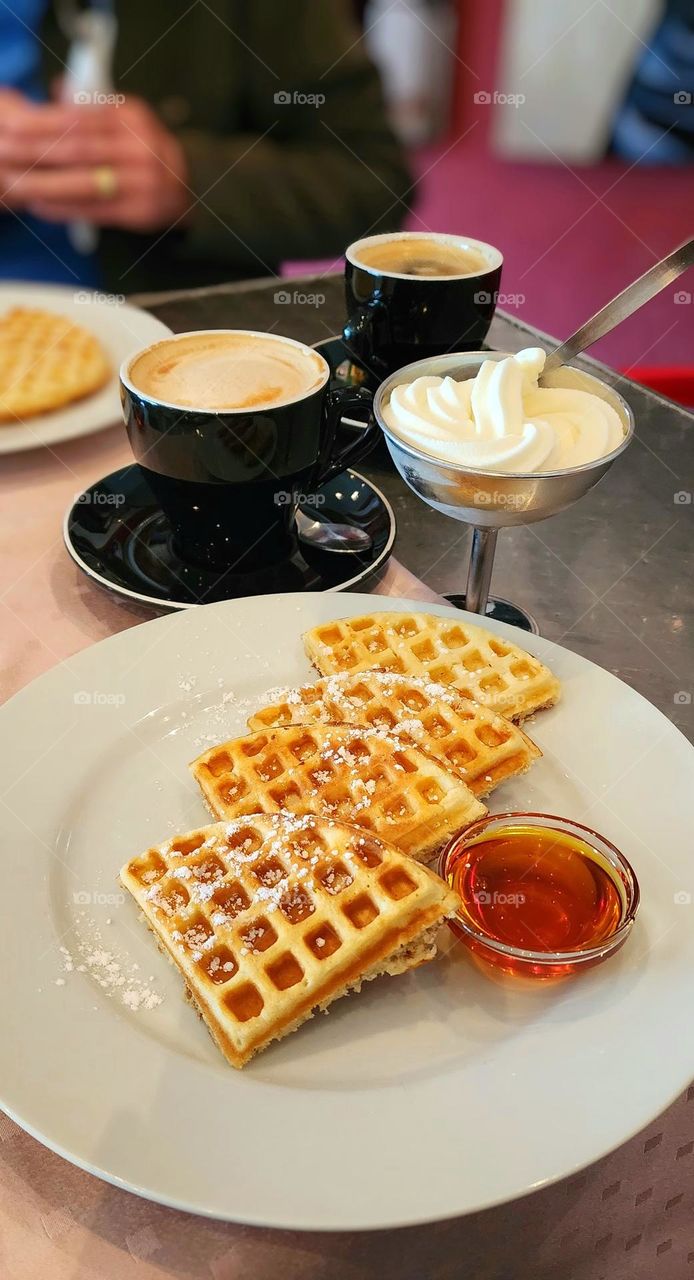 Waffles with ice cream and syrup and what is a waffle without coffee.