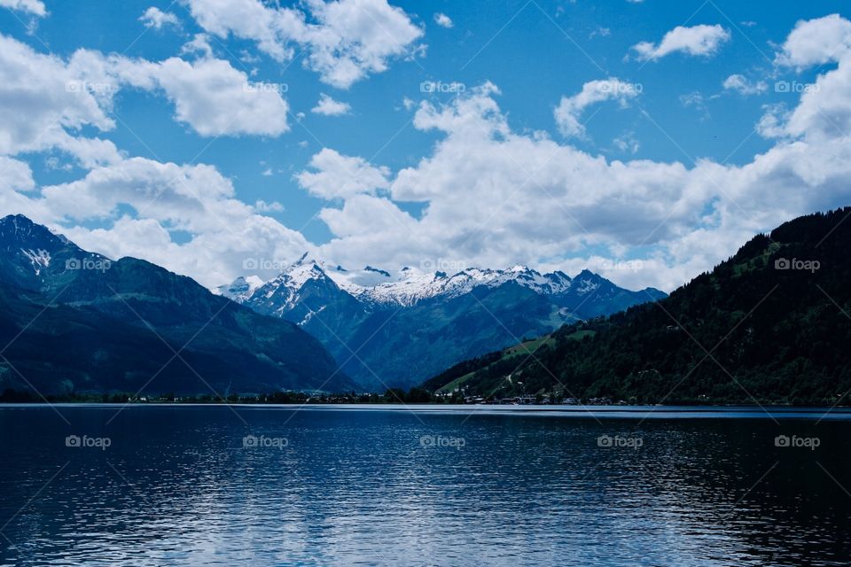A view over the lake to a snowy mountain