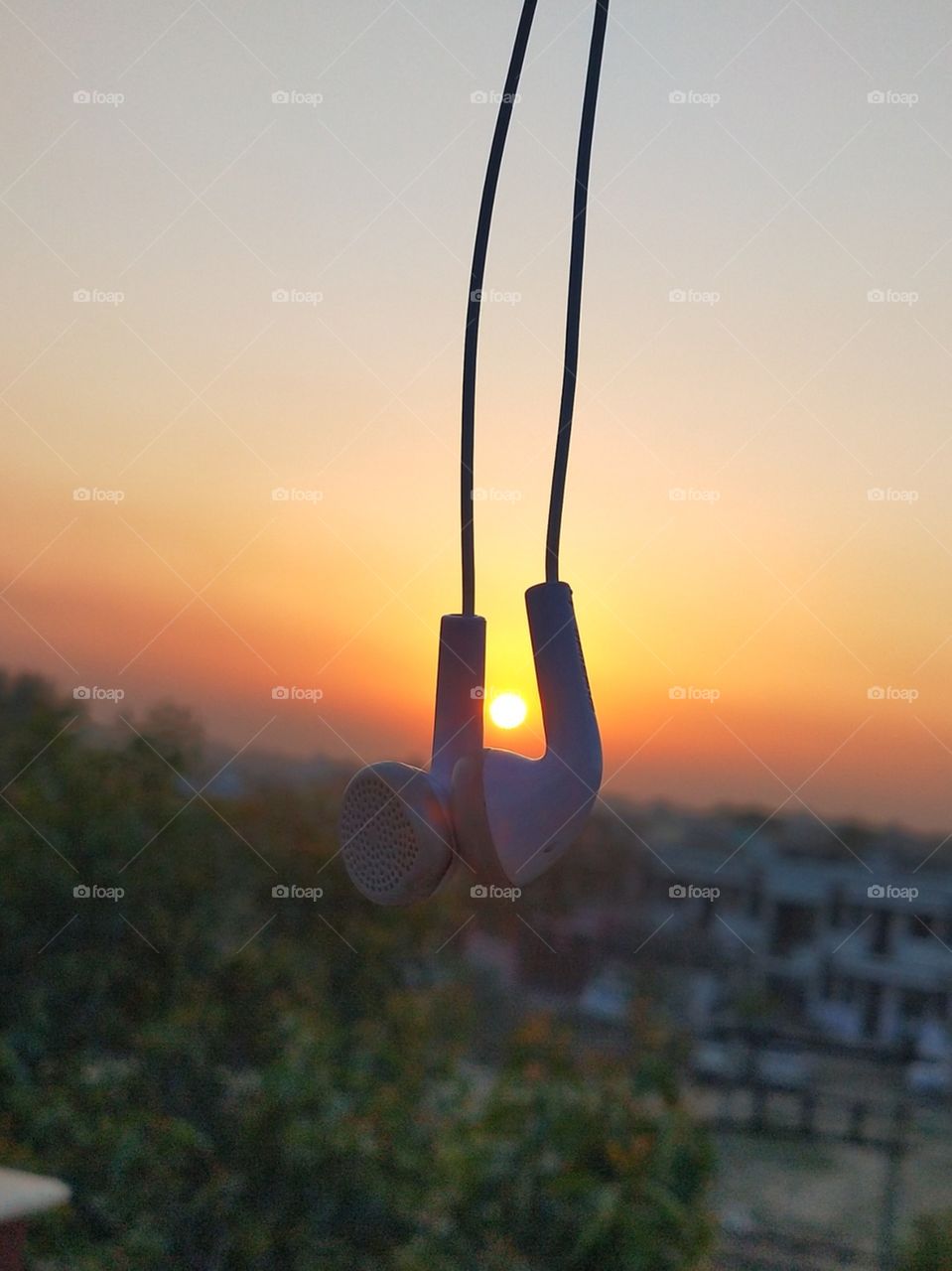 Sunset view and some romantic music what else I want. I personally love this shot because it depicts calmness and happiness in a very beautiful way.😍