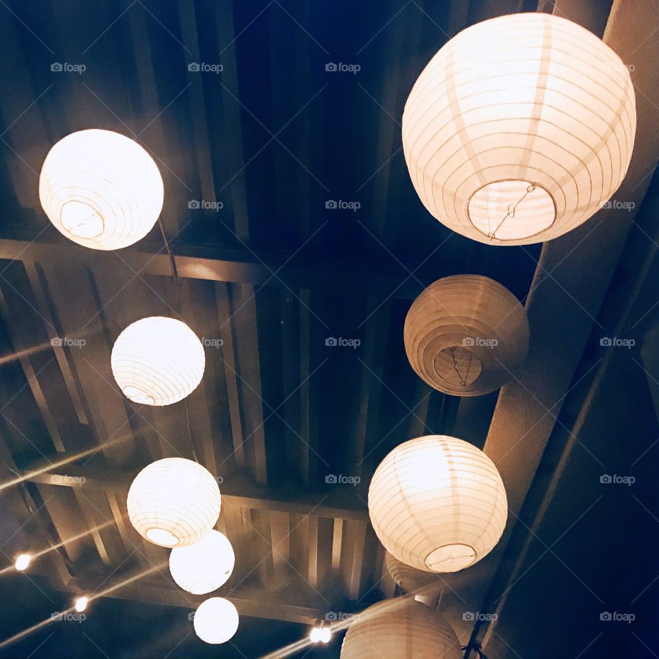 Beautiful, glowing, Brightly lit Lanterns glowing in the night sky in USA, America 