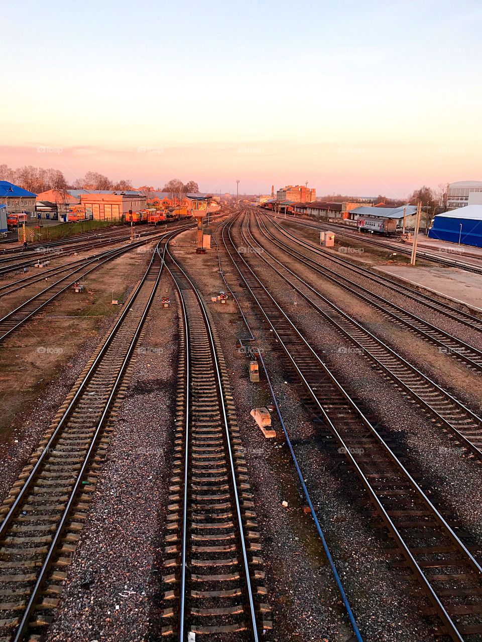 Railway tracks, lit by the evening sun
