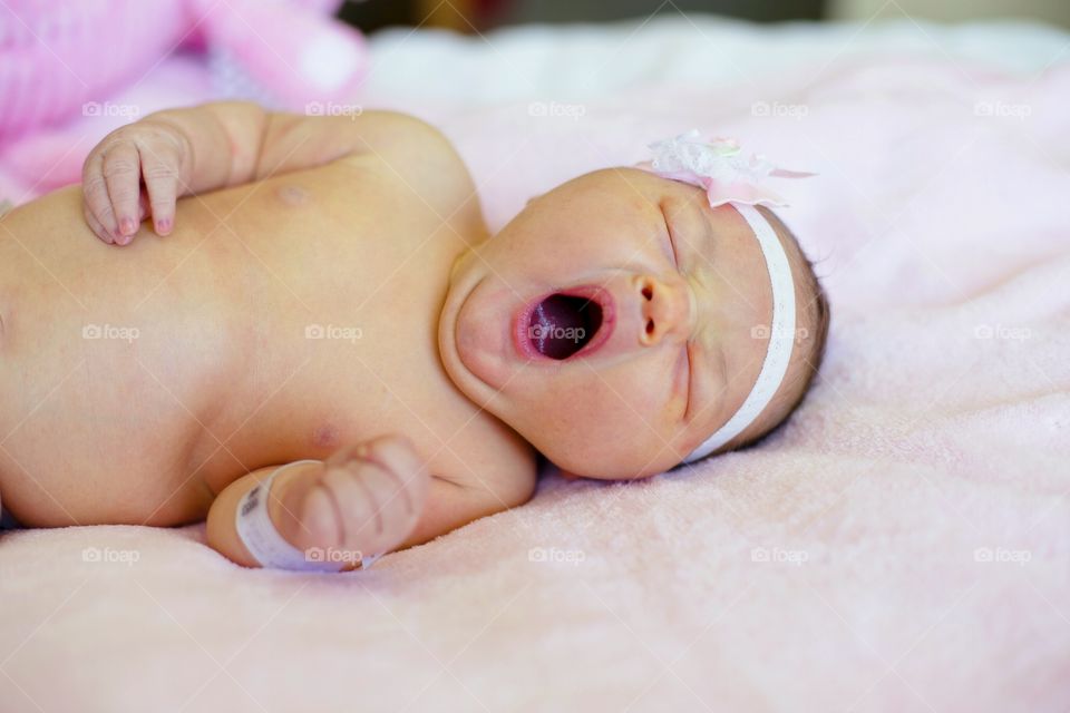 Close-up of a yawning baby