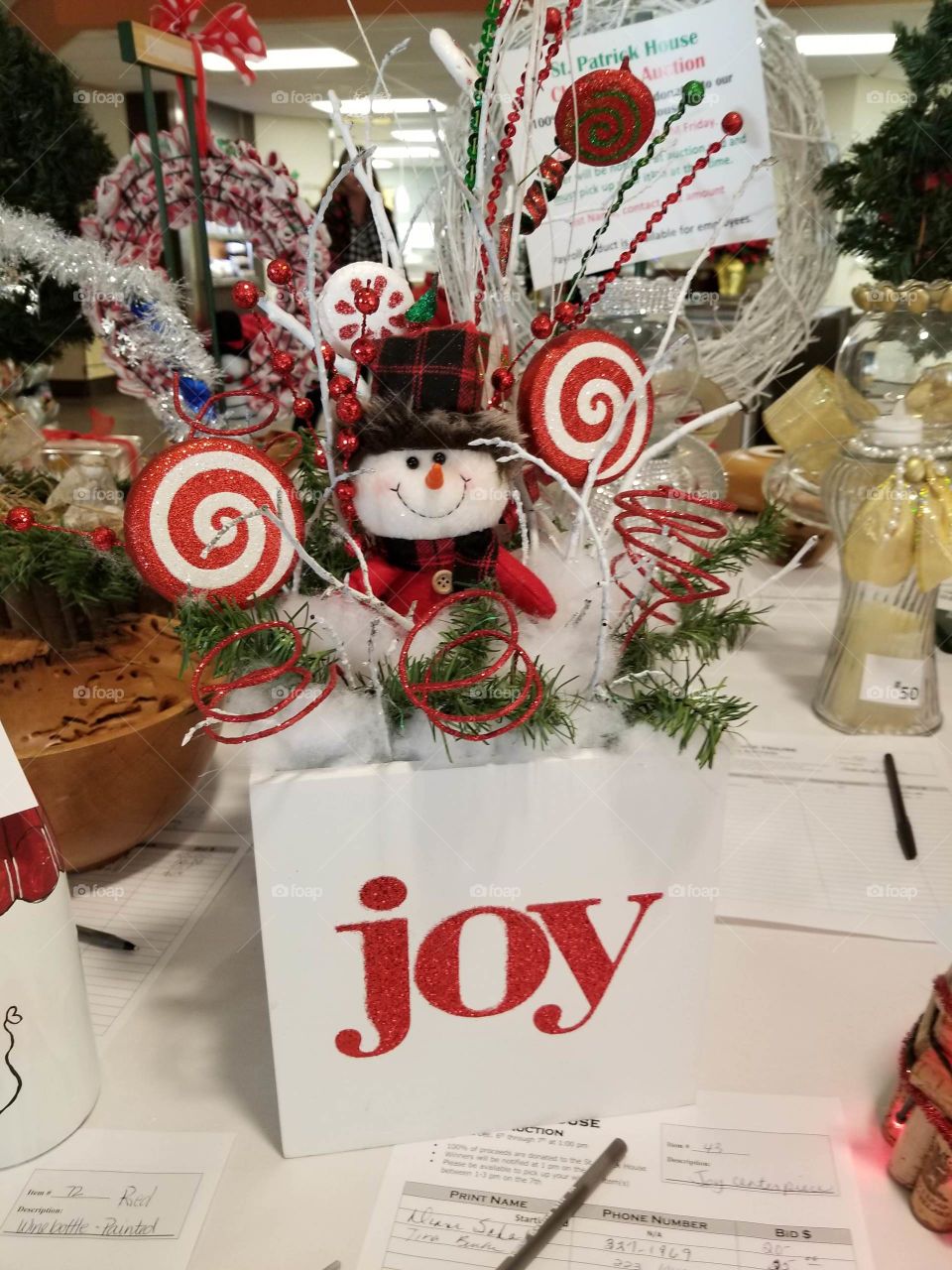 joy,  snowman holding two lolly pops, red and white decoration