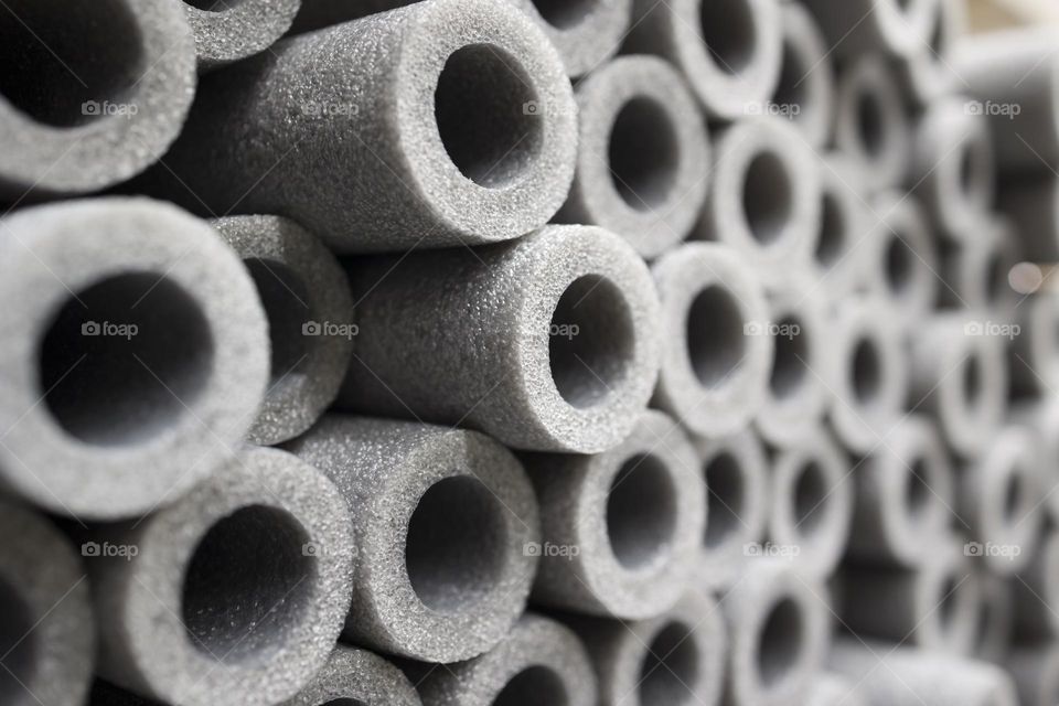 polyethylene foam pipe insulation background . soft focus