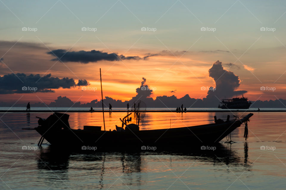 Long Tail Boat in front of sunset on Koh Phangan