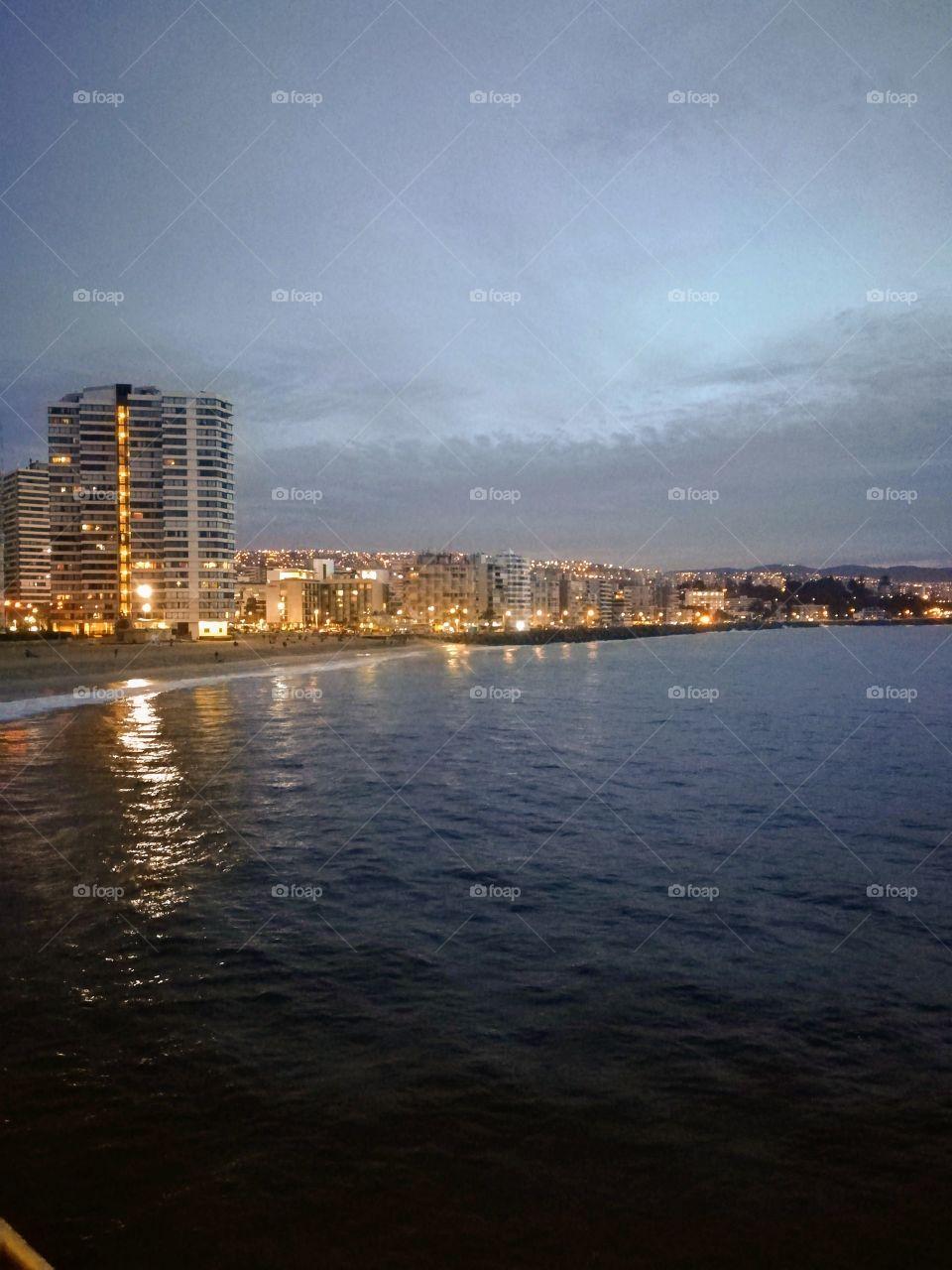 Captivating sunset on the coast of Viña del Mar seen from the fishing pier.