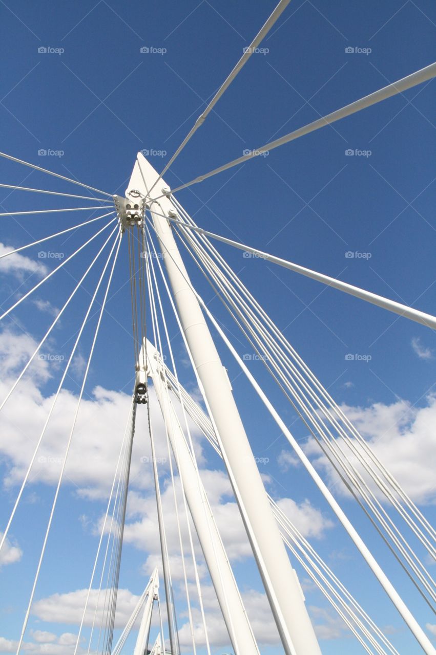 Beautiful bridge architecture in London. Love all the angles in this photography and the contrast with the blue sky!