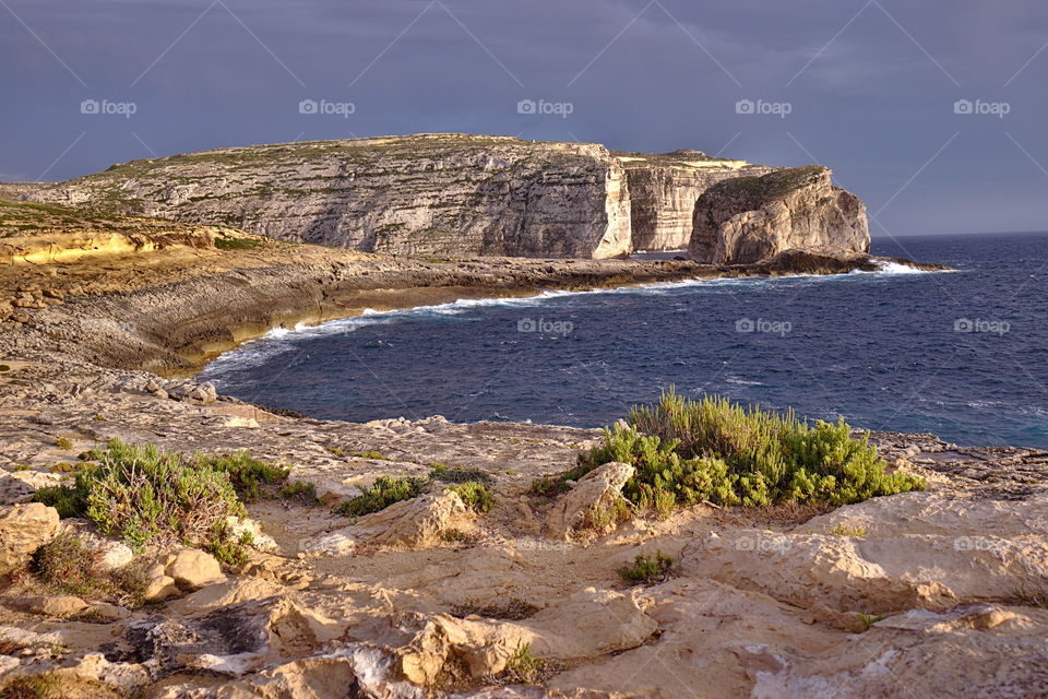 Beautiful cliff with sunset mood in dweira gozo close to the azure window.