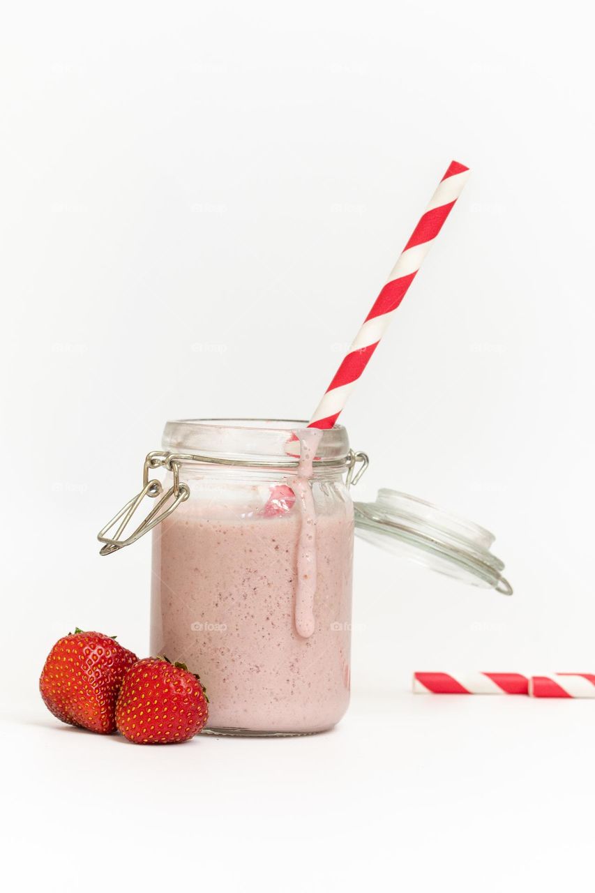 Glass jar with smoothie or milkshake 