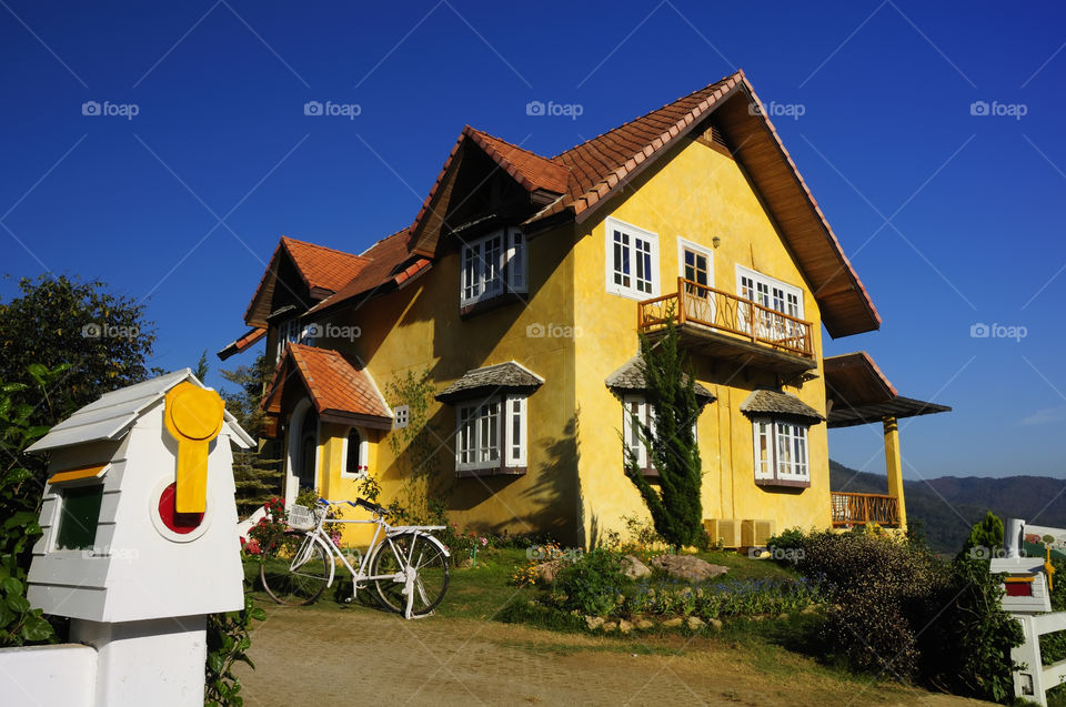 The Yellow House is located on a hill in the north, Thailand.