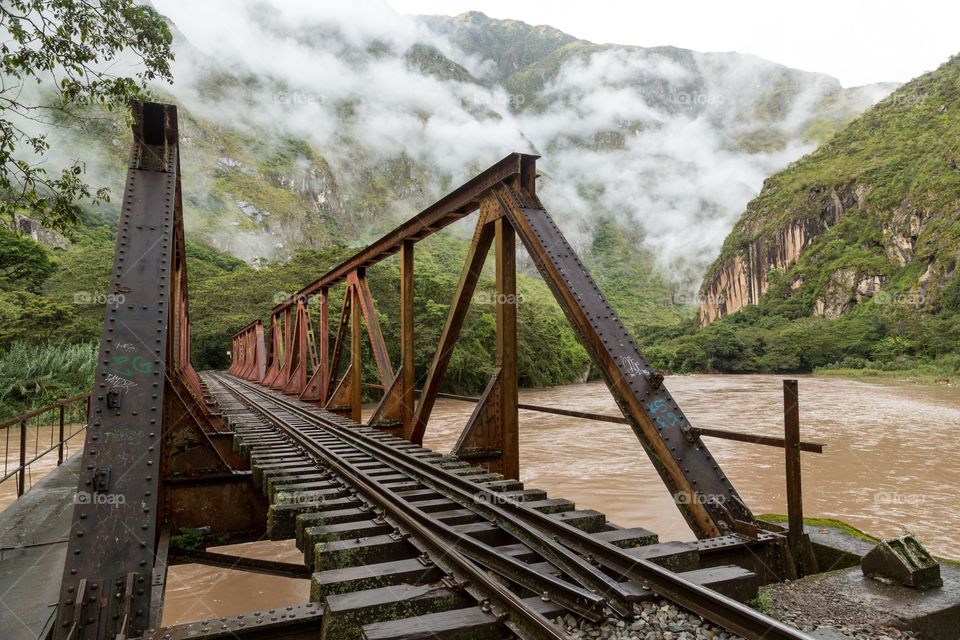 Old rusty railroad against mountain