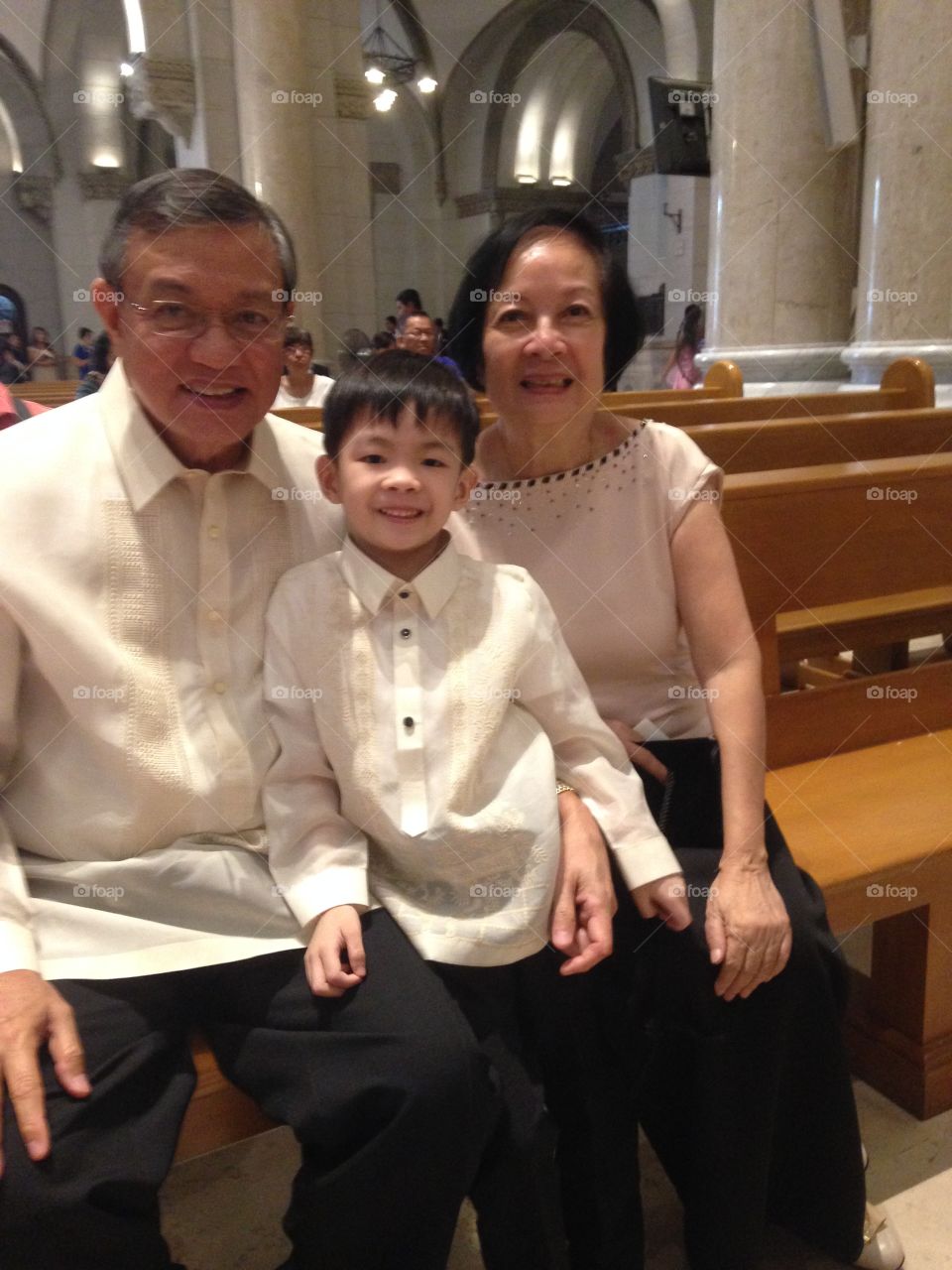 my wife and grandson  during a wedding inside the cathedral. my grandson was the coin bearer in the wedding