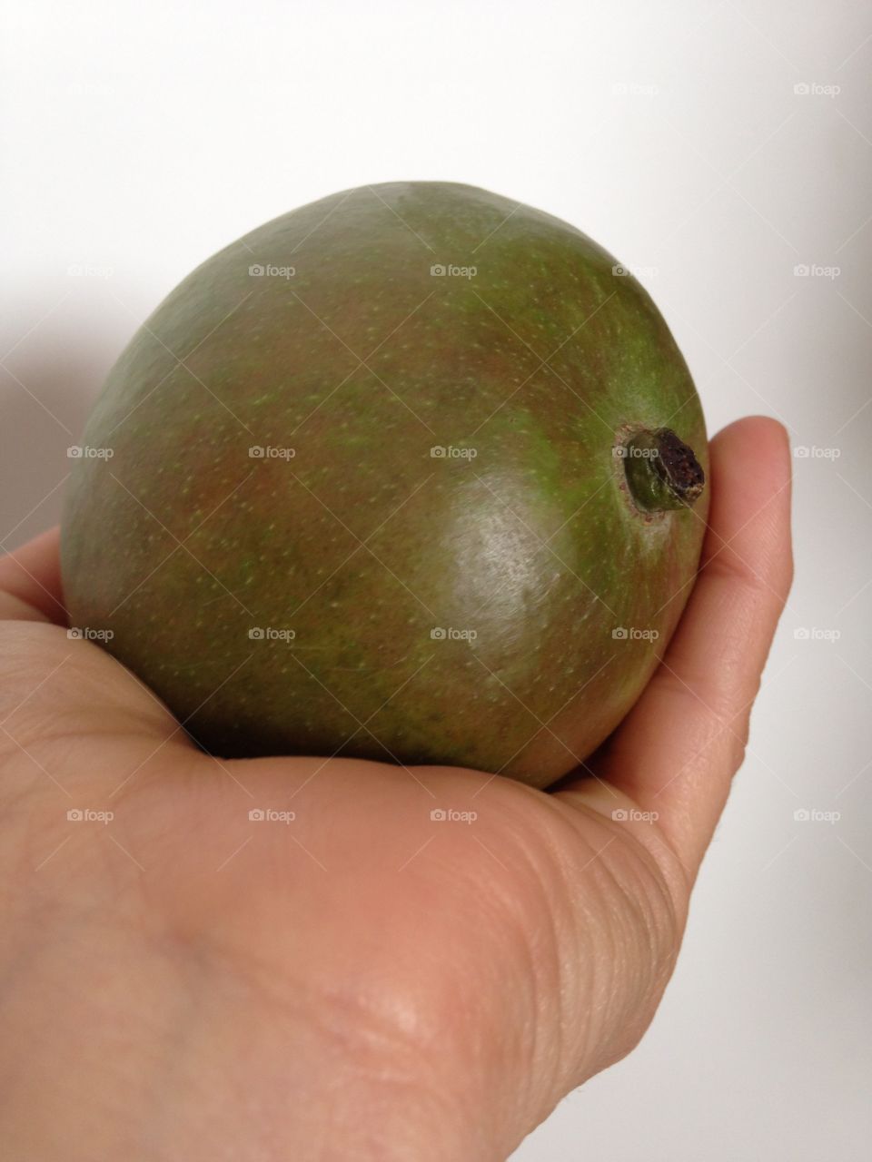 Holding avocado 