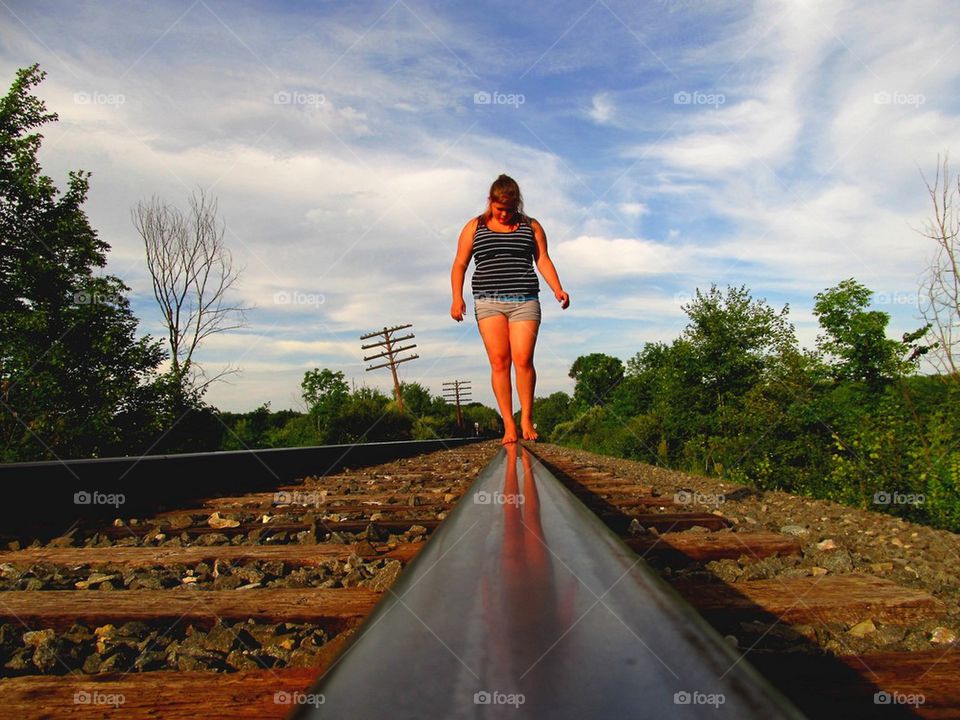 Girlfriends daughter walking the polished rails