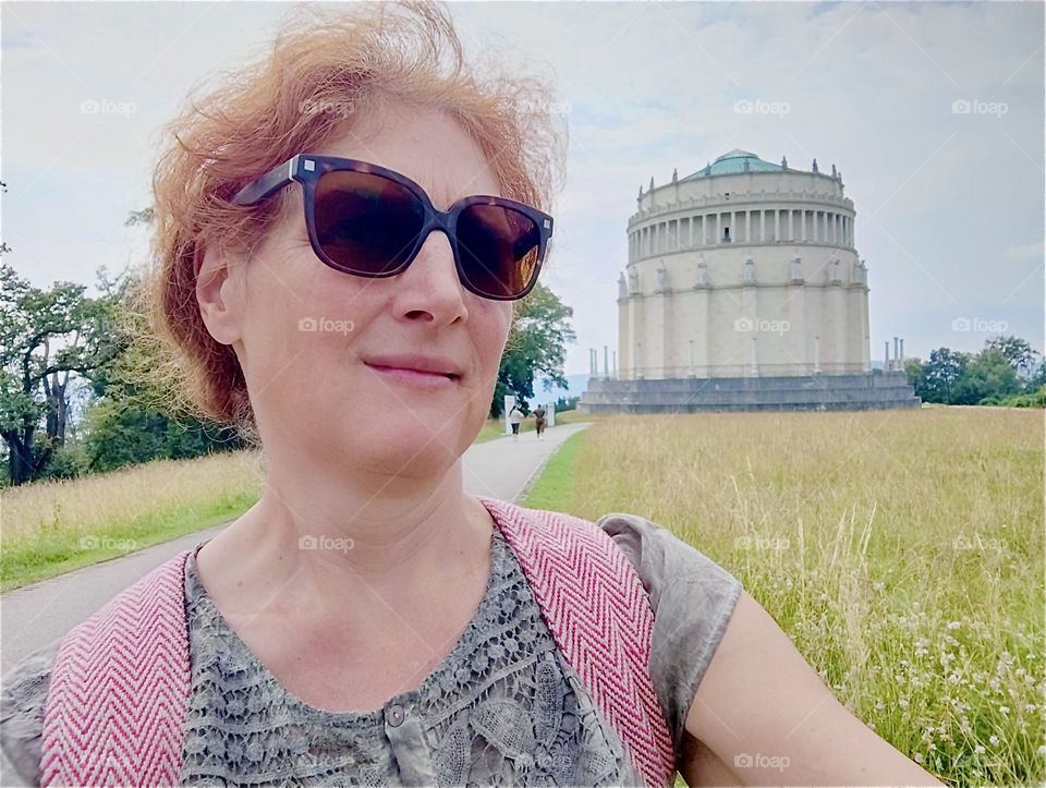 This lovely lady is visiting the famous “Liberation Hall” by “Kelheim”, Bavaria on the “Danube” built by King “Ludwig I” in 1815 to honor the victorious German fighters against “Napoleon” in the “Liberation Wars”. 2024. Hypnotic Productions