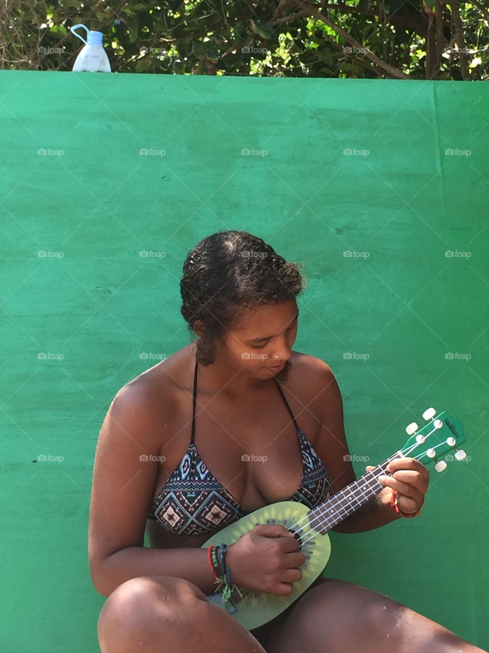 Playing the ukulele against the perfect backdrop