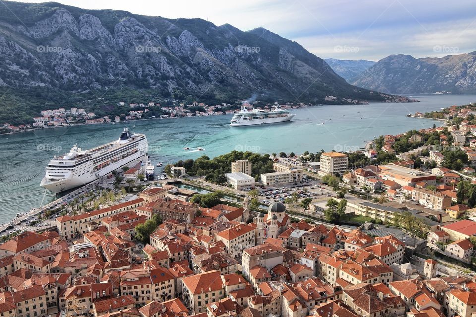 Aerial view of the old city, bay and mountains