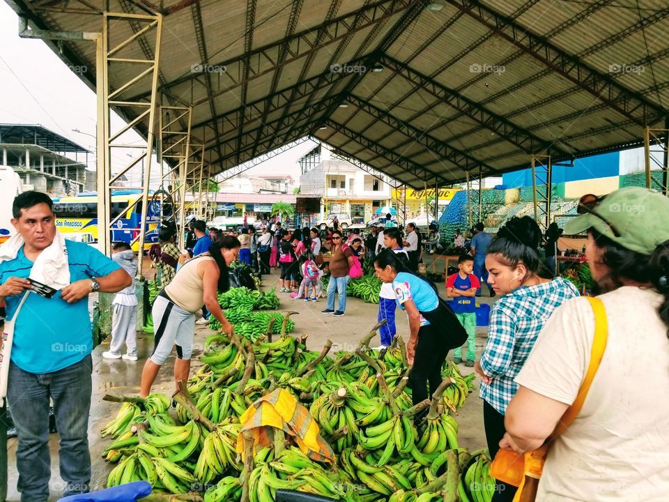 bustling bus station in Puyo Ecuador where fresh plantains are always for sale.