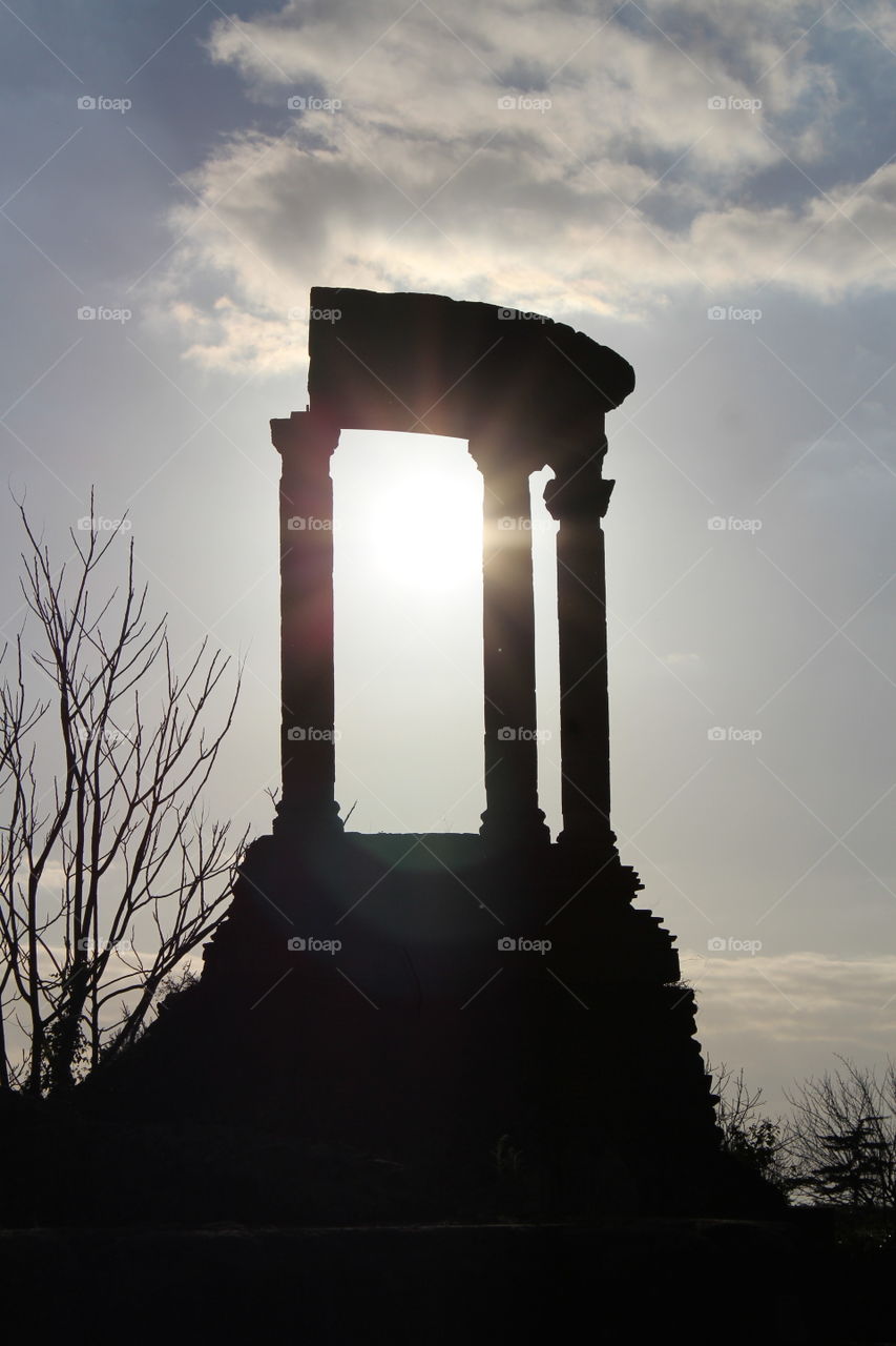 Columns - ruins of Pompeii and the sun