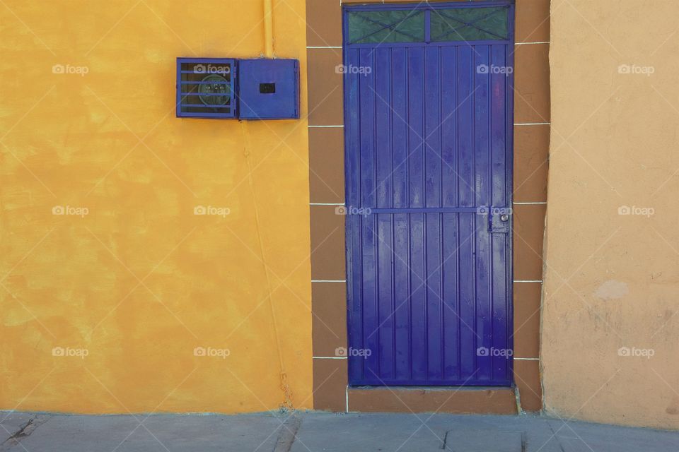 A colorful front entrance of a house in San Miguel de Allene, Mexico.
