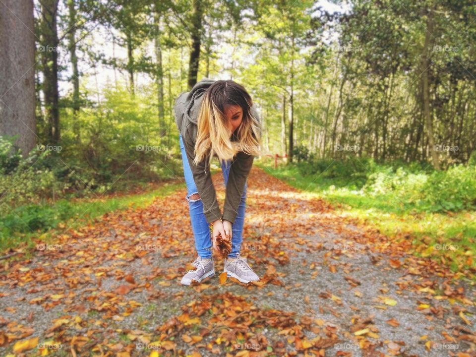 young women in autumn forest