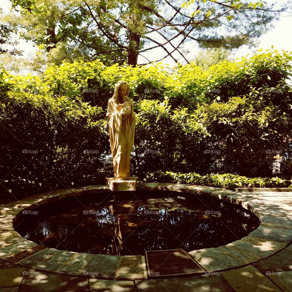 virgin mary statue at the Basilica's Mary's Garden