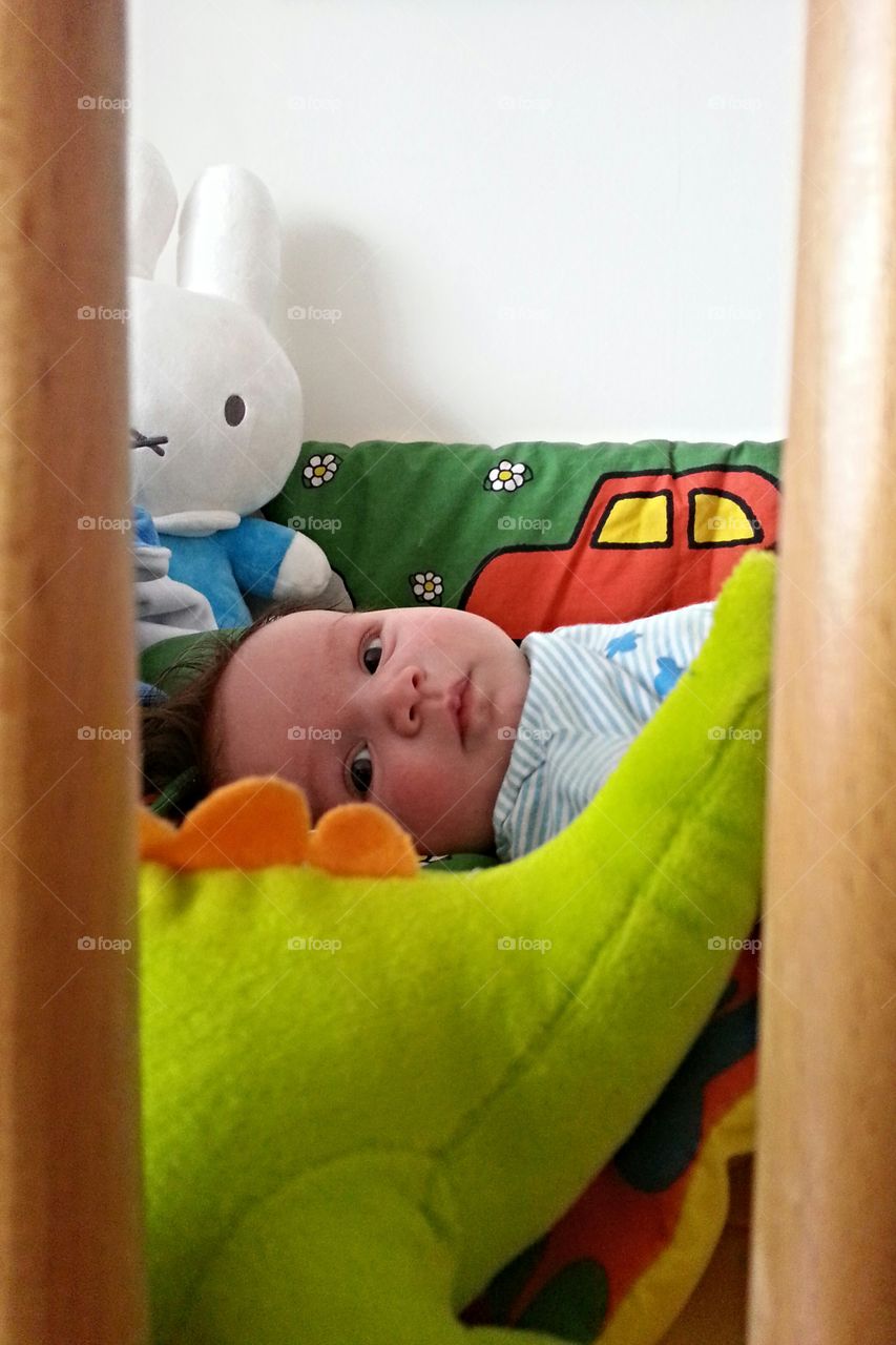 february 2013. my 1 month old son, looking at me, wondering. just a nice moment