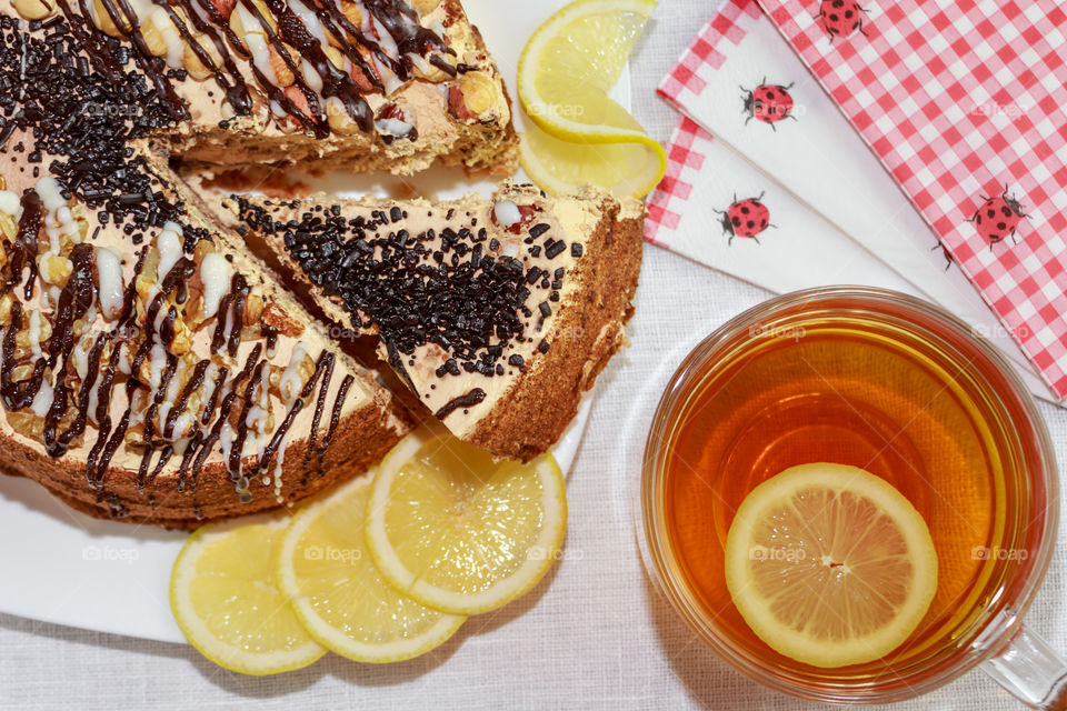 cake and a tea with lemon