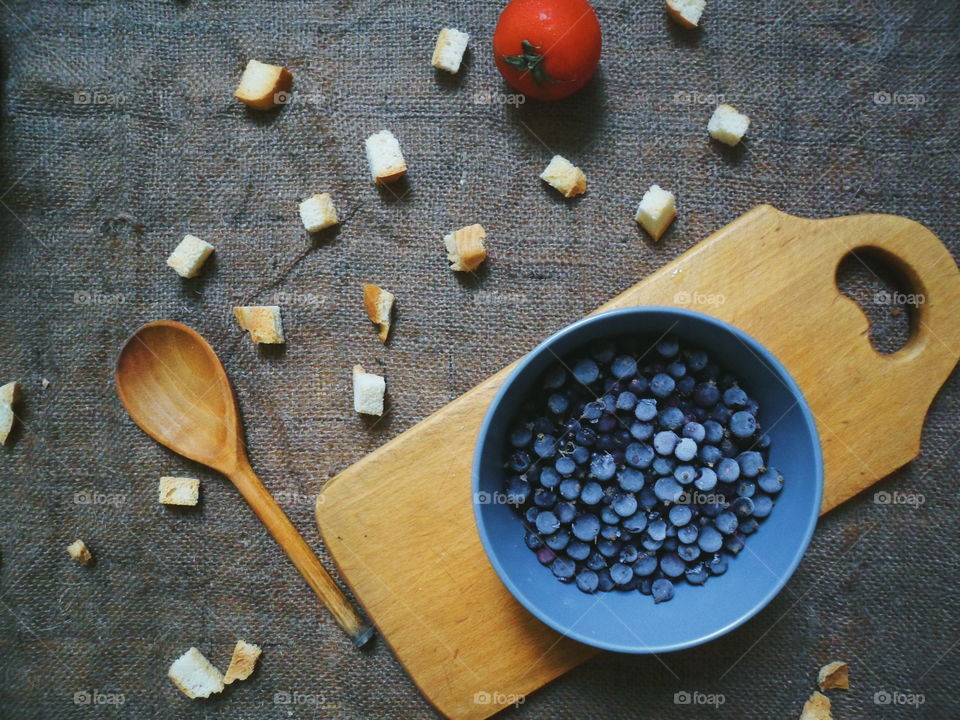 frozen currant, tomato on the table